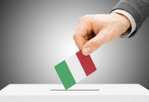 Referendum sulla caccia: l’analisi di Ugo Magri Referendum sulla caccia: elettore depone bandiera italiana nell'urna